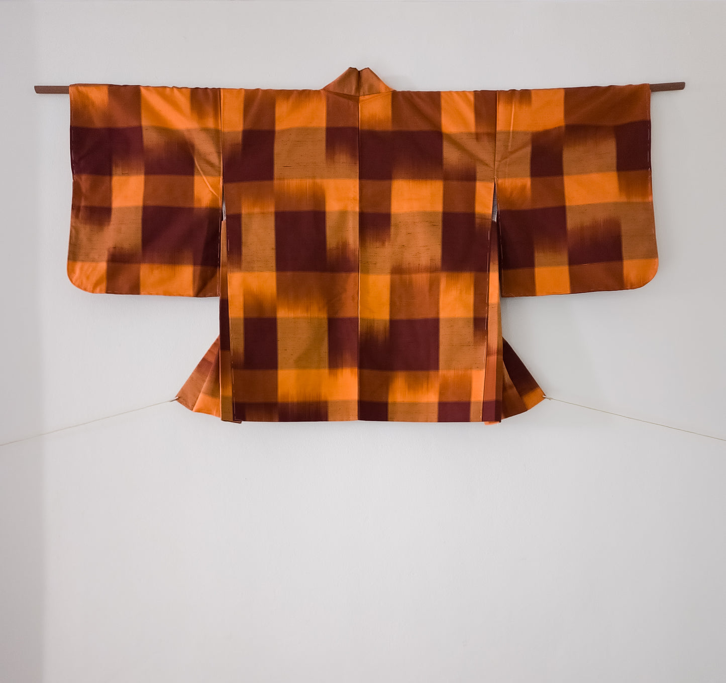 Orange and black meisen check haori