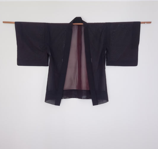 Sheer black haori with red stripe internals