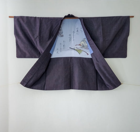 Indigo tsumugi haori with light blue theatre motif internals