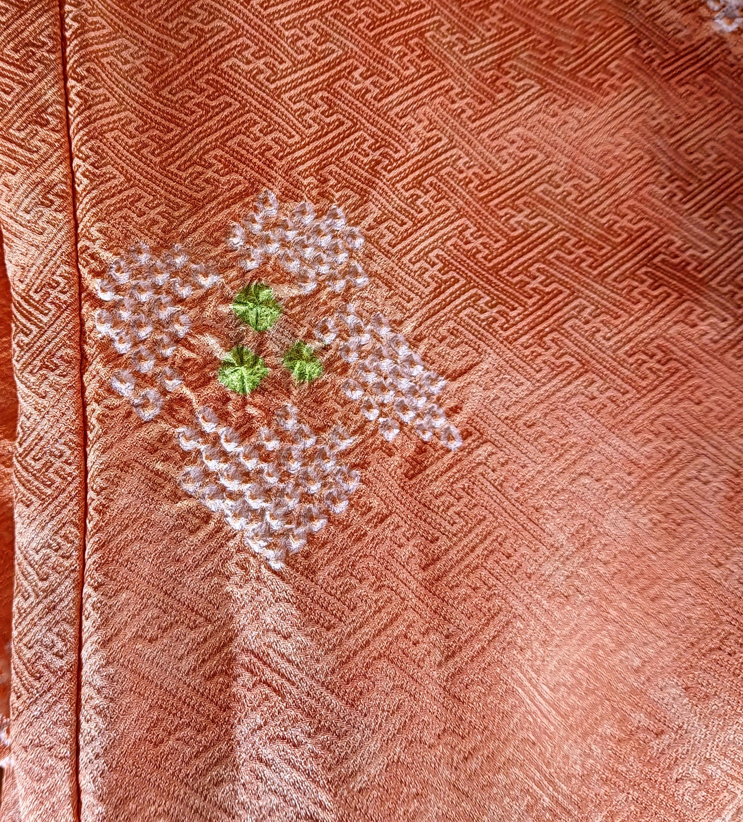 Coral jacquard komon kimono with shibori flower motif