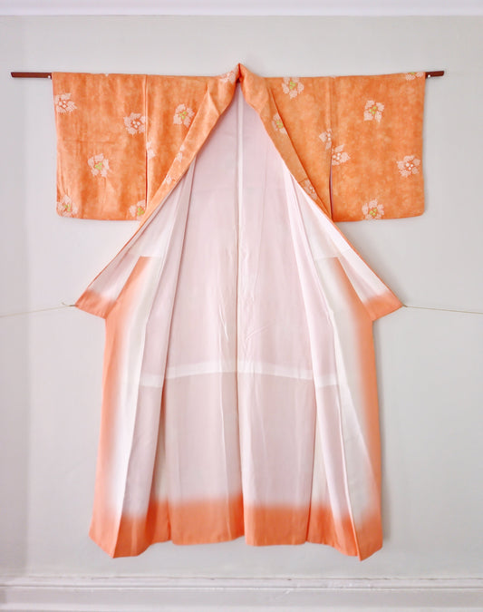Coral jacquard komon kimono with shibori flower motif