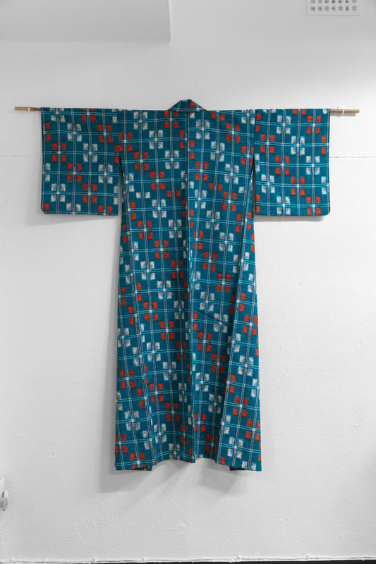Turquoise base orange kasuri kimono